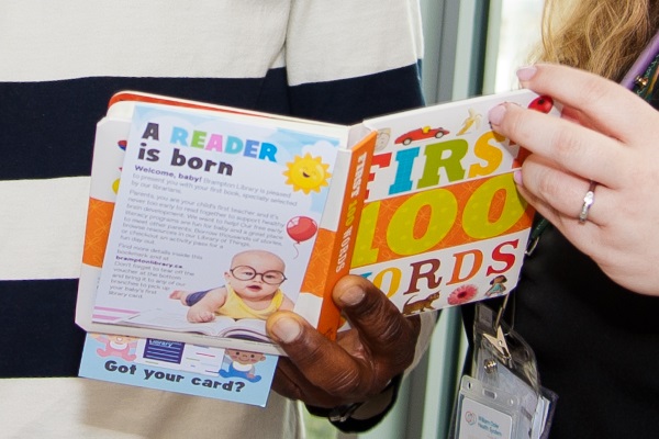 Every newborn at Brampton Civic Hospital receives a book and voucher for a free Brampton Library card. (Credit: Herman Custodio)