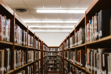 Photo of books on library shelves
